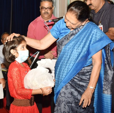 governor adopts tb girl child