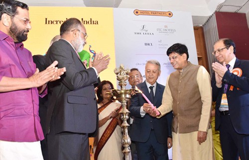 piyush goyal lighting the lamp at the inauguration of the india tourism mart