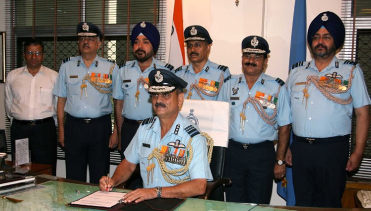 air marshal s.s. soman with psos and ifa in his office