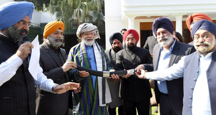 pm meets afghanistan sikh-hindu delegation