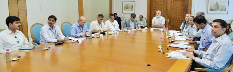 prime minister narendra modi reviews crop insurance