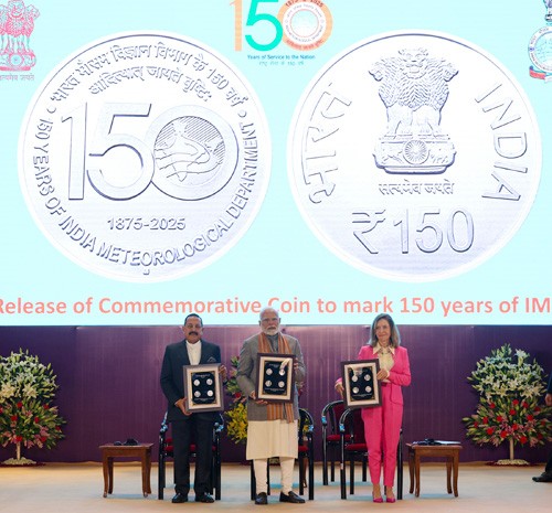 commemorative stamp and coin released on imd's foundation day