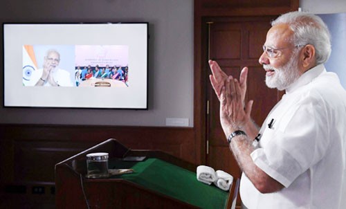 pm narendra modi interacting with the asha, anganwadi and anm workers