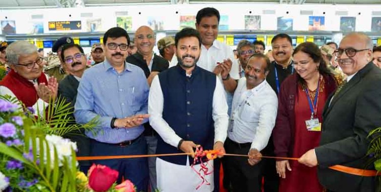 civil aviation minister inaugurated the cafe by cutting the ribbon