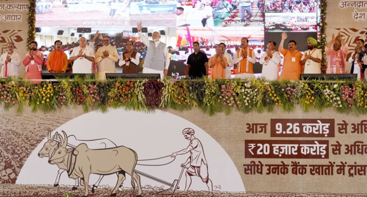 narendra modi at the kisan samman sammelan in varanasi