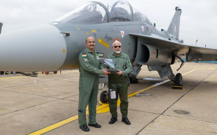 congratulating the prime minister after the flight in tejas