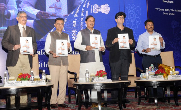 dr. mahesh sharma releasing the 'india–the land of yoga'