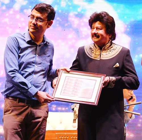 director postal kk yadav presenting my stamp to pankaj udhas at jodhpur