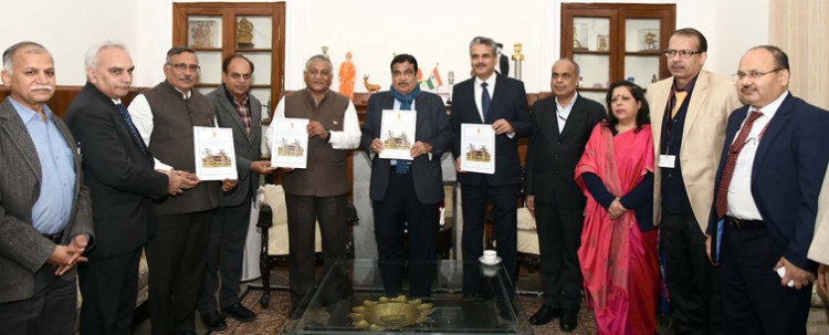 nitin gadkari releasing the report of the committee constituted