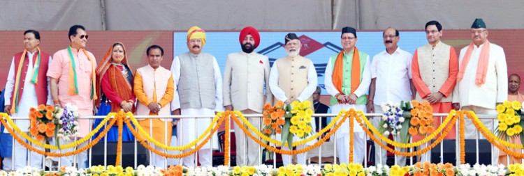 pm attending the oath taking ceremony of pushkar singh dhami