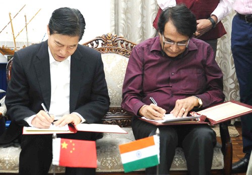 zhong shan and suresh prabhu signed the consent agreement